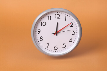 Close-up of a wall clock. The concept of time and work time is valuable for life, Alarm clock...