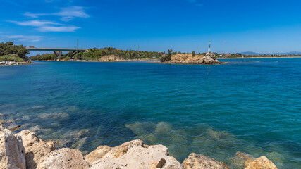 View of the canal of Nea Potidea with bridge and lighthouse