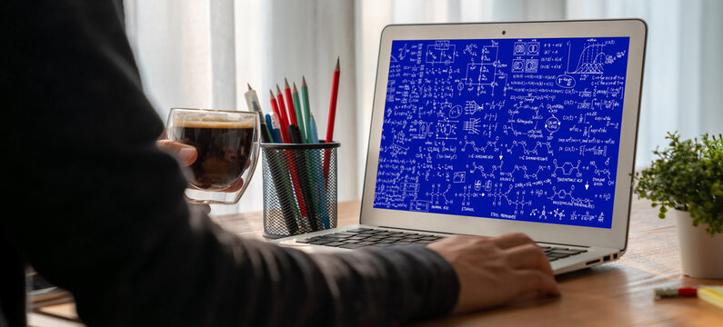 Mathematic equations and modish formula on computer screen showing concept of science and education - Powered by Adobe