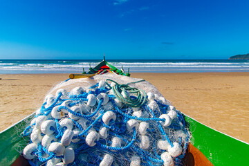 barco e rede de pesca de tainha Praia do Santinho Ingleses Florianopolis Santa Catarina Brasil