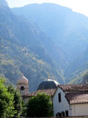 Exploring the Historical Architecture of Kotors Old Town in Montenegro Near Majestic Mountains