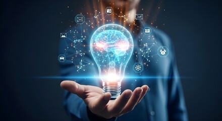 A person holds a glowing lightbulb with a brain inside, symbolizing innovative ideas and technological advancements.