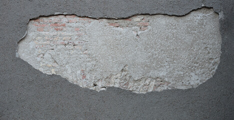 Old Vintage Red Brick Wall With Sprinkled grey Plaster Texture Background. Old brick wall for...