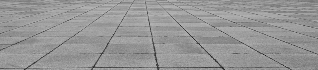 Business concept - empty marble floor top in perspective view background for display or mockup product. Gray grey tiles outdoor urban land, construction Tiled flooring.