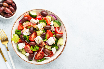 Greek salad, healthy food, mediterranean diet. Fresh vegetables, cheese and olive oil.