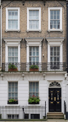 Naklejka premium Elegant row house facade with classic design. 
