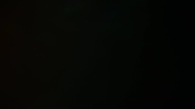 Light organic leaks effect background animation stock footage. Lens light leaks flashing around making an elegant abstract background animation. Classic Light Leak in 4k