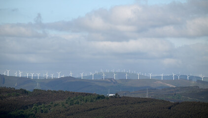 Wind turbines on top of a mountain ridge