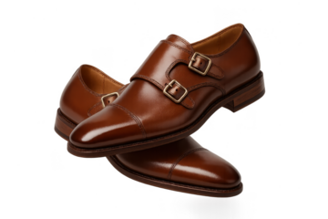 Elegant brown leather double monk strap shoes isolated on transparent background