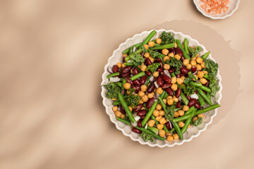 Fresh mixed bean and chickpea salad. Vegetarian dishes rich in plant protein. Copy space