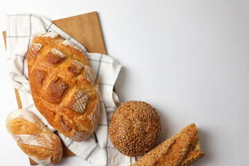 A delightful variety of Fresh Breads, beautifully displayed against a bright background