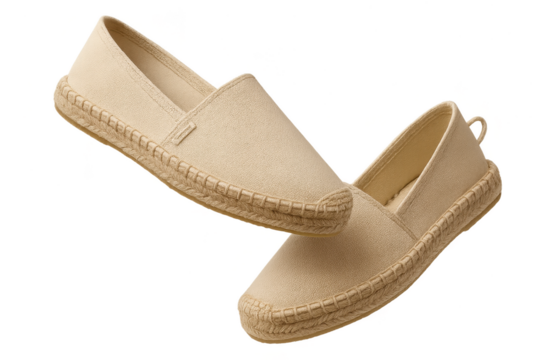 Beige espadrilles stacked and isolated on a transparent background for design