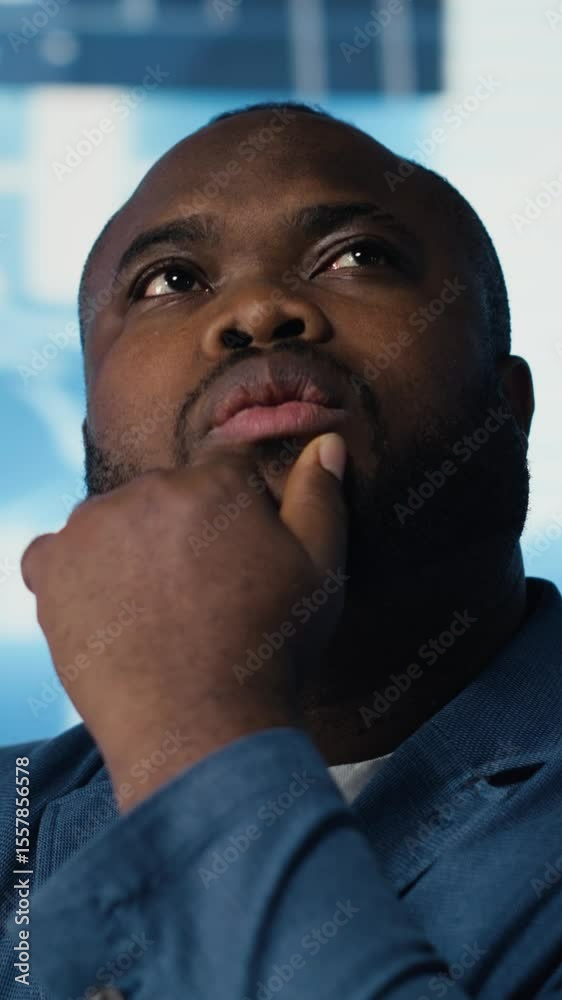Poster vertical video african american it specialist examining artificial intelligence interface, showcasin