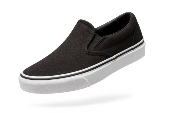Black slip-on canvas shoe with white sole isolated on transparent backdrop