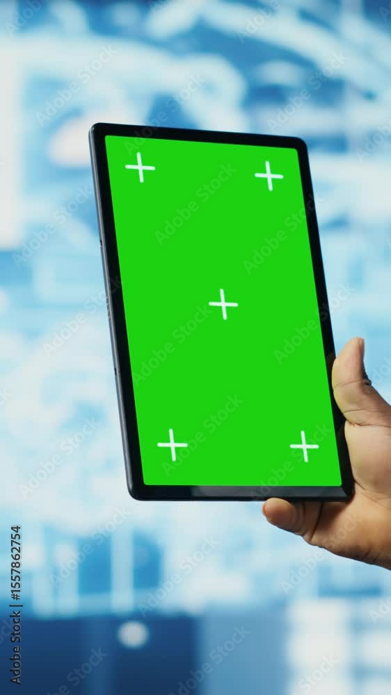Poster vertical video african american expert holds tablet with isolated screen next to cloud computing sys