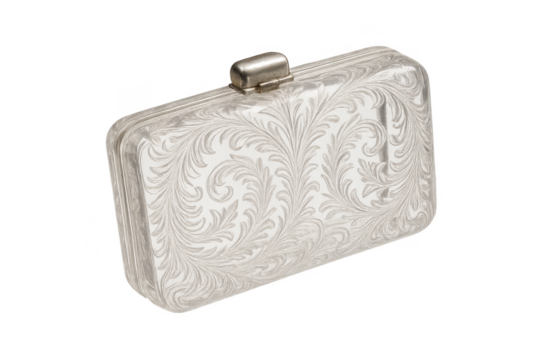 Elegant silver clutch bag with intricate scrollwork pattern isolated on transparent background - Powered by Adobe