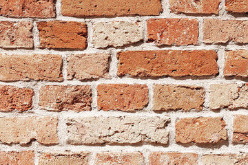 Red brick wall background. Rustic masonry pattern of old textured bricks with white mortar....