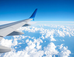 Obraz premium Stunning Aerial View Airplane Wing Above Cloud Cover