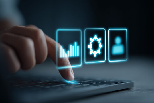 Hand operating digital ui on laptop trackpad