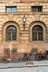 Bicycles parked in front of a charming historic building in Gamla Stan, Stockholm
