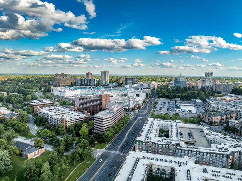 Aerial View: Towson Town Center, a prominent retail and lifestyle hub in Towson, Maryland with cloudy blue sky