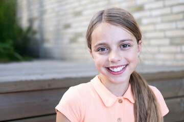 portrait of a young girl with a smile