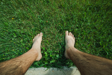 Barefoot Grounding on Green Grass Point of View 