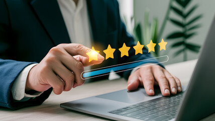 Businessman is using his finger to choose five stars on a digital screen, illustrating the concept of customer satisfaction and business success in quality rating.