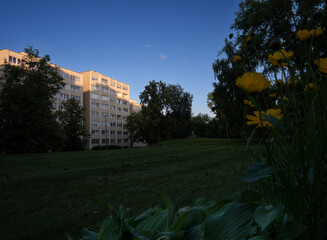The building illuminated by evening sunlight