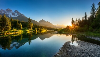 tranquil sunrise over a crystal clear river reflecting majestic mountains and lush forest