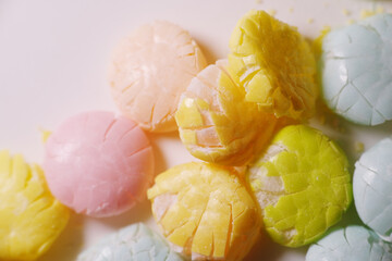 Close up texture of crushed chewy coated candy