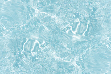 Blue water with ripples on the surface. Defocus blurred transparent blue colored clear calm water...
