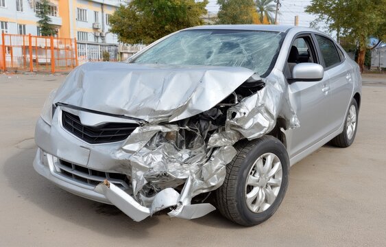 Severe car accident highlighting the dangers of urban driving and reckless behavior