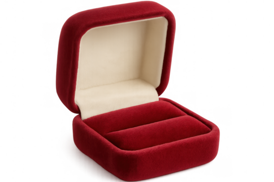 Red velvet ring box holding wedding bands, sitting elegantly on clear surface, capturing romantic moment before ceremony