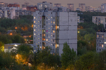 Serial standard panel residential building in a green area