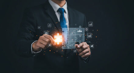 Hand Holding a Glowing Puzzle Piece to Complete a Digital Business Strategy Board