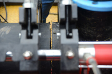 Welding plastic pipe for a hydro unit