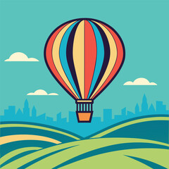 Colorful hot air balloon over rolling hills and cityscape