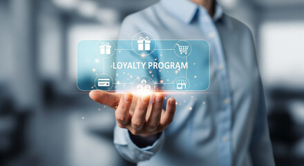 Person holding a digital loyalty program interface with gifts and shopping cart icons displayed