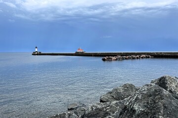 Obraz premium Pier and lighthouse on Lake Superior