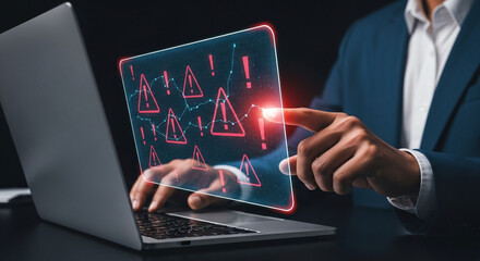 Man in suit interacting with laptop displaying error alerts and warning signs on transparent screen