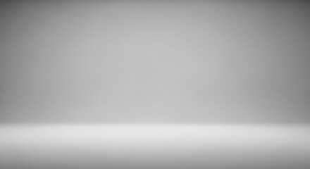 Empty gray studio room background with a smooth gradient for product display. Abstract minimalist backdrop with a clean, modern look.