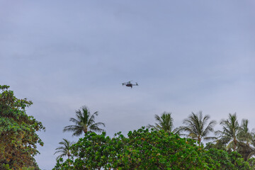 Drone above Patong Beach at Sunset on the island of Phuket Thailand