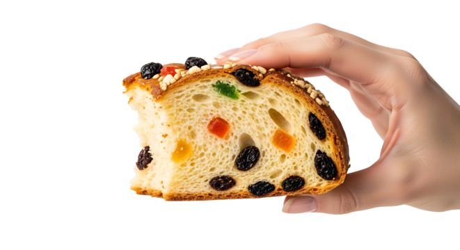 A hand holding a half-eaten slice of raisin bread.