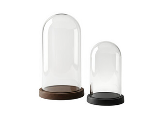 Two glass domes with wooden and black bases, isolated on transparent background