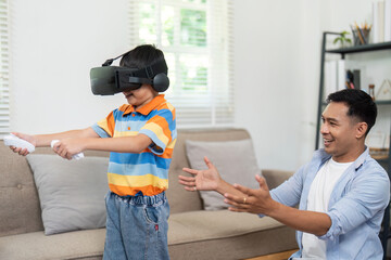 Virtual Reality and Family Interaction. A father watches his son play a VR game at home.