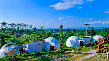 glamping tent view with blue sky background