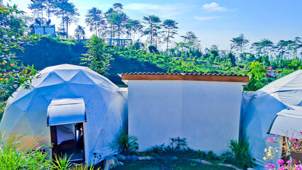 glamping tent view with blue sky background