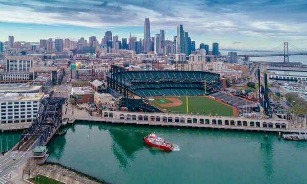 Aerial view of Oracle Park, home of the San Francisco Giants baseball team, with the city skyline and Bay Bridge in the background,, San Francisco, California, USA. 11 Marh 2025