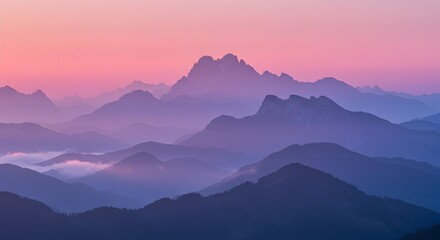 Beautiful mountain range at dusk with soft hues of pink, purple, and blue sky